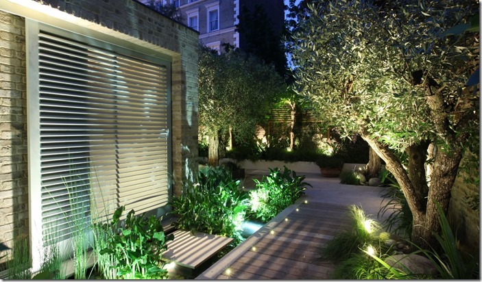 Outside lights in London  garden designed by 