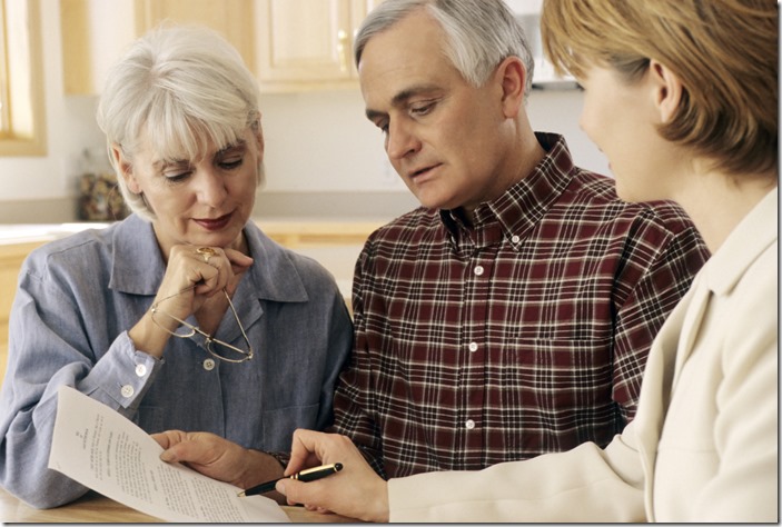 Senior couple meeting with agent